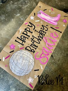 a brown paper bag with pink writing on it that says, happy birthday goddy