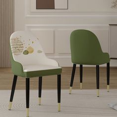 two green and white chairs sitting on top of a rug