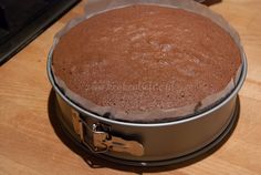 a cake sitting on top of a wooden table