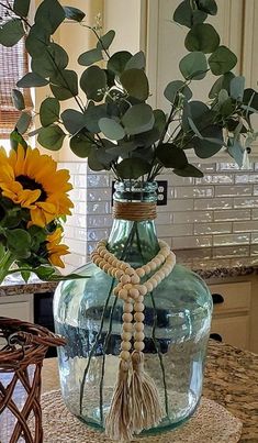 a vase filled with flowers on top of a table