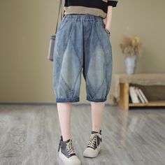 Details: Gender: Women Item Type: Shorts Material: Denim Season: Summer Pattern: Patchwork Style: Casual, Loose, Retro Waist Type: Elastic Waist Size: One Size Waist: 68.00 - 104.00 cm/ 26.77 - 40.94 " Length: 66.00 cm/ 25.98 " Hip: 126.00 cm/ 49.61 " Thigh: 70.00 cm/ 27.56 " Bottom: 46.00 cm/ 18.11 " Patchwork Denim, Summer Pattern, Retro Summer, Summer Patterns, Denim Patchwork, Elastic Waist, Denim Shorts, Elastic, Blue