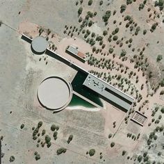 an aerial view of a building in the desert