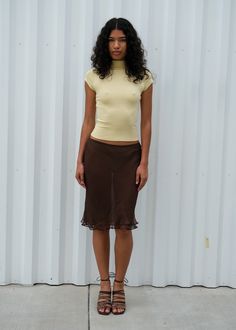 The Rosie Skirt is a sheer, double-layered, knee length silk skirt with a bias hem and elastic waist. Made in collaboration with Cierra O'day Style Inspiration Going Out, Slip Skirt And Tshirt, Cute Tops With Skirts, Cierra O'day, Mini Slip Skirt Outfit, Thrifted Skirt Outfit, Long Skirt Business Casual, Bias Skirt Outfit, Oversized Shirt And Skirt Outfit