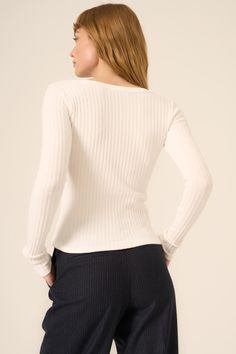 Here's the scoop: this is your new favorite tee.Our What's The Scoop Washed Rib Long Sleeve is the perfect blend of fashion and comfort, thanks to our iconic sweater rib fabric and washed-dye technique. The wide rib fabric, scoop neck, and fitted silhouette keep this long sleeve looking tailored while still feeling comfy. If you love our iconic Cooper Sweater Rib Tank, you'll loveee this one. 94% Cotton4% Polyester2% Spandex Care Instructions: Machine wash cold. Wash inside out with similar colo Here's The Scoop, Cardigan Crop Top, Rib Fabric, Denim T Shirt, Cardigan Crop, Flowy Pants, Sweater Tank Top, Fitted Silhouette, Romper Pants