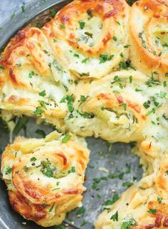 some food that is sitting in a pan on the table and ready to be eaten