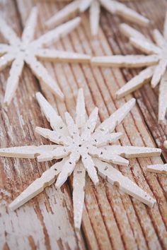 an instagram photo with snowflakes on the wooden floor and text that reads instagram