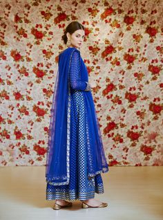 Editor's Note This set features a royal blue embroidered long kurta with dupatta and trouser. Color: Royal Blue Fabric: Silk Chnderi Brocade And Georgette Embroidery Details: Zardozi Care: Dry Clean Only Customize Your Outfit Can't find the size you're looking for? No stress. Just select the size "Custom" while adding the item to your cart. We will follow up with you for your body measurements. To request a color or design customizations, please contact our customer care by using our "Ask us a q Royal Blue Fabric, Kurta With Dupatta, Blouse Yoke, Embroidered Anarkali, Long Kurta, Casual Tunics, Indian Ethnic Wear, Fabric Silk, Embroidery Details