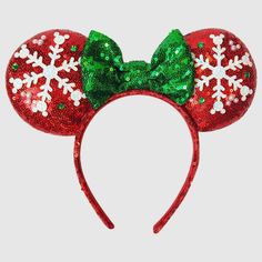 Elevate your kid's winter looks by accessorizing with the Disney Red Snowy Minnie Ear Headband. This red headband is designed to look like Minnie's ears with snowflake detailing on the ears and green bow, all adorned with sequins for an eye-catching look. Suitable for all types of hair, this headband is suggested for ages three and up. All Types Of Hair, Disney Minnie Mouse Ears, Minnie Ears Headband, Minnie Mouse Ears Headband, Red Headband, Types Of Hair, Mouse Ears Headband, Minnie Mouse Ears, Green Bows