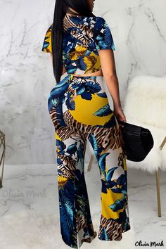 Olivia Mark - Blue Floral Print Bandage Patchwork V-Neck Short Sleeve Two-Piece Outfit for Women Yellow V-neck Sets For Summer, Fitted V-neck Printed Sets, Blue V-neck Vacation Sets, Yellow V-neck Summer Set, V-neck Two-piece Vacation Set, Vacation V-neck Two-piece Set, Fitted Yellow V-neck Sets, Spring Blue Tropical Print Jumpsuits And Rompers, Blue V-neck Sets For Vacation