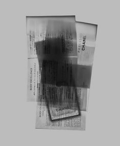 an image of some newspaper on top of each other