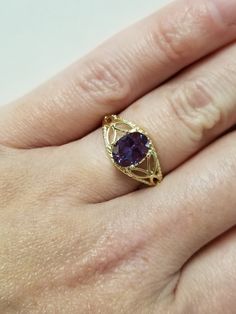 "Thanks for shopping our vintage estate store. We tend to sell well below wholesale and truly hope you enjoy all of our items. Many of the items are one of a kind, so please enjoy scrolling through the pictures and hopefully something will catch your eye. Spots are from reflections or camera. Estate 14k yellow gold created 1.5ct alexandrite cocktail filigree ring. The color of the gem is blue, purple to green with some pink, depending on light. No scratches on the gem. Stunning. Vintage setting, Gold Oval Gemstone Filigree Ring, Heirloom Filigree Ring With Center Stone, Oval Shape, Classic Oval Amethyst Ring Collectible, Collectible Oval Amethyst Ring In 14k Gold, Vintage Oval Amethyst Ring In 14k Gold, Classic Oval Amethyst Ring With Accent Stones, Vintage Oval Sapphire Birthstone Ring, Classic 14k Gold Filigree Ring In Oval Shape, Antique Oval Amethyst Ring For Anniversary