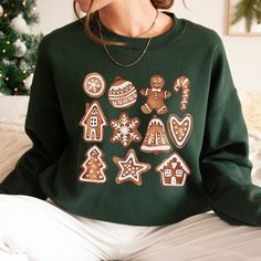 If you love Christmas cookies, this Cookie Baking Crew Gingerbread Cookie Crewneck Sweatshirt is perfect for you! Adult Unisex Sweatshirt Gildan 18000 *If you are interested in purchasing this shirt in a color that is not listed above, please contact me and I will see what I can do! I have added a color chart for you to reference, but please note that all colors may not be available. *If you really love this design but would like it on a different garment (sweatshirt, tank top, mug, bag, etc...) Cookie Sweater, Cookie Baking Crew, Christmas Cookie Party, Cookie Christmas, Christmas Crewneck Sweatshirt, Cookie Party, Ginger Cookies, Gingerbread Cookie, Christmas Cookie