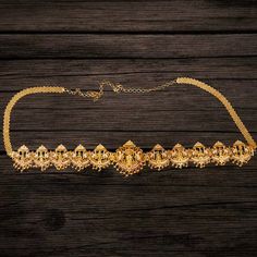 About the Jewellery This Antique Chain Vaddanam by Asp Fashion Jewellery is a timeless piece. With its detailed features such as antique Nagas finish, and beautiful Dashavatar motifs, it is sure to impress. Make a statement with this exquisite piece. Details & Specifications: Materials used: Silver,Brass Polish-24 k gold Finish -antique Stone's-kemp Length -40 Inches(For30 To 40 Inches Waist) For-Women Occassion-Wedding Antique Vaddanam, Chain Vaddanam, Vanki Ring, Brass Polish, Antique Stone, Belly Chain, Bangle Set, Body Jewellery, Fashion Jewellery