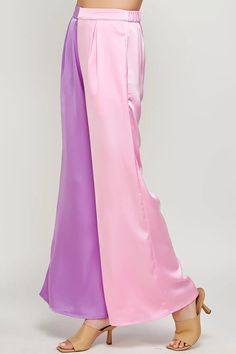 Color block Satin Wide Palazzo pants. These trousers feature elasticated waist at back for comfort, side pockets, wide legs, front pleats, and color block construction. 100% polyester. *Available at our Rehoboth Beach location or Online. Wide Palazzo Pants, Satin Wide Leg Pants, Beach Location, Colorblock Pants, Purple Color Block, Rehoboth Beach, Satin Pants, Pants Large, Wide Legs