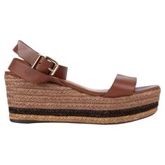 100% authentic Fendi ankle-strap espadrilles wedge sandals in brown leather with striped raffia sole and gold-tone buckle closure. Have been worn and are in excellent condition. Measurements Imprinted Size 41 Shoe Size 41 Inside Sole 26cm (10.1in) Width 8cm (3.1in) Heel 8cm (3.1in) Platform: 4cm (1.6in) All our listings include only the listed item unless otherwise specified in the description above Ankle Strap Wedges, Strap Wedge, Leather Espadrilles, Espadrilles Wedges, Wedge Sandals, Ankle Strap, Clothing And Shoes, Brown Leather, Espadrilles