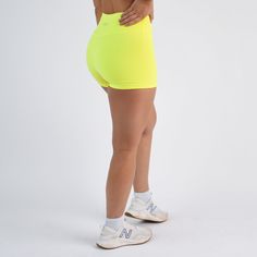 The no front seam short of your dreams. Ascend is for the athlete looking for a smooth front short with maximal leg freedom. These shorts have a 3.25” inseam, traditional side seams, and a high rise. Elevate your next training session in this distraction-free style. Neon Yellow: a solid you can get behind. The perfect shade for hot, sunny days, and strong legs. This vivid shade has brightness for days! High rise (same as Charge NFS) 3.25” inseam Double Lined in White No front seam Triangle gusset Designed for training & leg freedom Kate is 5'5" and wearing size S Athletic Fit Activewear With Built-in Shorts, Sporty Stretch Athletic Shorts With 5-inch Inseam, Solid Color Athleisure Shorts With 5-inch Inseam, Athletic Fit Bottoms With Built-in Shorts, Biker Shorts With Built-in Shorts For Training, Green Athletic Shorts With Built-in Shorts, Sports Shorts With Contoured Waistband And 5-inch Inseam, Training Activewear With Built-in Shorts, Workout Athletic Shorts With Built-in Liner