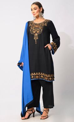 Indulge in the epitome of ethnic elegance with our exquisite 3-piece Salwar Kameez set. Intricately crafted, the Kameez boasts machine embroidery, handwork motifs, and delicate moti and CD embellishments adorning the front placket, exuding opulence and sophistication. Enhancing its allure, the Kurta features side pockets for modern convenience and intricate handwork detailing on the hem for added charm. Accompanied by a Piping matching dupatta, this ensemble effortlessly blends tradition with contemporary style, making it perfect for a myriad of occasions, from festive celebrations to formal gatherings. Elevate your wardrobe with this timeless ensemble that celebrates the artistry of Indian craftsmanship. Size & FitModel height is 5’9’ and is wearing a Small sizeMaterial & CareMaterial: Ra Eid Palazzo Set With Embroidered Border, Eid Lawn Suit With Embroidered Border And Straight Kurta, Lawn Suit With Embroidered Border For Eid, Unstitched Salwar Kameez For Eid Ceremonies, Eid Lawn Suit With Embroidered Border, Traditional Palazzo Set With Embroidered Border, Unstitched Palazzo Set With Embroidered Border For Eid, Designer Black Churidar With Embroidered Border, Traditional Long Sleeve Palazzo Set With Embroidered Border