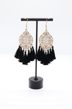 This is a pair of gold filigree earrings with black tassels. They are very pretty and would be a great addition to any jewelry collection. Earrings Diy Handmade, Gold Filigree Earrings, Filigree Earrings, Holiday Jewelry, Gold Filigree, Wedding Weekend, Feather Earrings, Diy Earrings, Christmas Sale