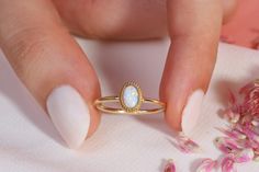 You can use it as a Opal Ring Gold 14K. Our Delicate Multicolor Opal Birthstone Stacking Ring is use as October Birth stone Band. This 10K 14K 18K Gold Colorful Gemstone Jewelry looks like 10K multicolor ring. Custom Personal Ring will be perfect gift for her as a mother. Dainty Birthmonth ring gift can be customized with your Birthstone or wedding month stone. We can turns it into a brilliant colorful opal ring. Our 18K bridesmaid ring is great multicolor accessory for her daily life. Its unique delicate ring exact matches with opal ring gold 14K. This stunning opal stacking ring symbolizes your love and serves as the ideal gift for your best friend, girlfriend, mom or grandmother. Please check our other birthstone rings: https://www.etsy.com/shop/minifinejewels?ref=seller-platform-mcnav& Dainty 14k Yellow Gold Opal Ring, 14k Gold Opal Ring With Halo Design For Anniversary, Dainty 14k Gold Solitaire Opal Ring, Dainty White Opal Ring In 14k Gold, Delicate 14k Gold Opal Birthstone Ring, Heirloom 14k Gold Halo Birthstone Ring, Delicate 14k Gold Opal Ring Gift, Gold Opal Ring With Halo Design - Gift, 14k Gold Opal Halo Ring For Promise