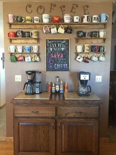 a coffee bar with lots of cups hanging on the wall