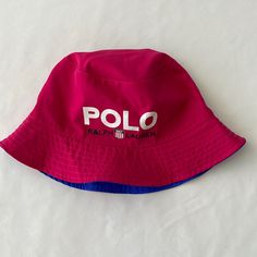 Polo Ralph Lauren Men’s Reversible Hats New With Tags One Size Color: Sport Pink/Blue Pink Bucket Hat With Short Brim For Outdoor, Casual Pink Bucket Hat For Outdoor, Pink Short Brim Bucket Hat For Outdoor, Pink Reversible Bucket Hat With Curved Brim, Casual Reversible Pink Bucket Hat, Pink Curved Brim Bucket Hat For Outdoor, Casual Pink Reversible Hat, Spring Pink Reversible Hat, Polo Outfits