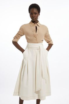 Feel Confident In Our Midi Skirt, Featuring A High, Belted Waistline That Cinches The Silhouette, A Formal, Flowing Silhouette, And A Classic, Pleated Design. Style It With A Blouse And Court Heels Or Ankle Boots For A Look Perfect For Office Days, Then Wear It With Heeled Boots Or Stilettos For An Evening Look. Tailored Full Skirted Belted Midaxi Skirt Flattering Flared Silhouette Comfortable High Waistline Statement Belted Waist Classic Pleat Features Zip Fastening On Hip Formal Skirt Outfit Classy, Formal Skirt Outfit, A Line Skirt Outfits, Petite Wedding Guest Dresses, Flared Midi Skirt, Midaxi Skirt, Plus Size Workwear, Chic Outfits Classy, Office Fits