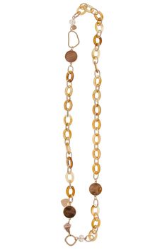 Our Aisha Necklace is crafted from links of gold metal and amber-hued resin, adorned with unique stone pendants and heart-shaped charms. This long necklace makes an eclectic statement wherever you go. Wear this out on a sunny day and watch as the sun gleams down making it ever so sparkling. Materials: Glass Beads, Resin Links Size: 40" Long Imported Long Chain Necklace, Long Chain, Sunny Day, Stone Pendants, Long Necklace, Crystal Necklace, Gold Metal, The Sun, Amber