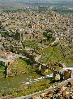 an aerial view of a city and river