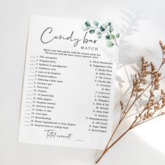 a card with the words candy hour written in cursive writing on it next to a plant