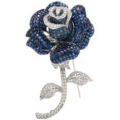 The pin is finly crfted in 18k ehite gold with diamonds weighing approximately total of 4.30 carat and sapphire weighing approximately 70.14 carat. Beautiful and unique pin. Luxury Brooches With Rose Cut Diamonds, Luxury Sapphire Brooches As Gifts, Luxury Sapphire Brooches For Gift, Luxury Flower Shaped Brooch Jewelry, Luxury Sapphire Brooches Gift, Luxury Sapphire Brooches As A Gift, Luxury Sapphire Brooches For Formal Occasions, Luxury Sapphire Brooches For Formal Events, Luxury Sapphire Brooch Jewelry