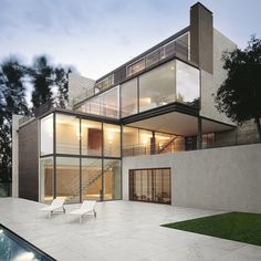 a modern house with an outdoor swimming pool