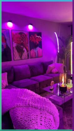 a living room filled with furniture and purple lighting