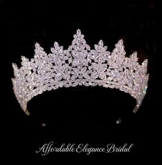 a tiara with crystal stones on the side and leaves in the middle, against a black background