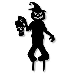 a black and white silhouette of a jack - o'- lantern holding a skull