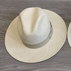 Handcrafted in Ecuador Entirely handmade from natural toquilla straw Provides protection from UV rays Beige Crown: 4 1/2" Brim: 6-7 cm Adjustable sweatband Ribbon: 1 3/8" Unisex Straw Fedora Hat, Straw Cowboy Hat, Straw Fedora, Black Ribbon, Fedora Hat, Cowboy Hat, Uv Rays, Hat Sizes, Ecuador