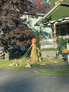 a halloween decoration in front of a house