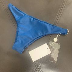 Mikoh Lahaina Bikini Bottom In Drop Off Blue - Small - New With Tags Nwt Colors: Blue Bottom Style: Cheeky Bottoms 80% Nylon, 20% Spandex. Hand Wash Cold, Dry In Shade New With Tags! Nwt High Waist Blue Swimwear For Swimming, Blue Beachwear Bottoms For Beach Season, Blue Bottoms For Pool Beach Season, Blue Summer Bottoms For Sunbathing, Blue Bottoms For Sunbathing In Summer, Blue High Waist Swimwear For The Beach, High Waist Blue Swimwear For Beachwear, Blue High Waist Beachwear Swimwear, High Waist Blue Beachwear Swimwear