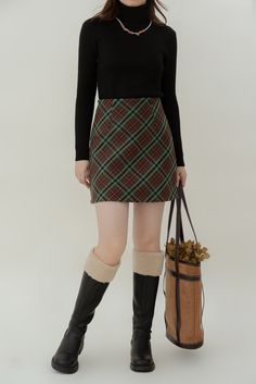 Faux wool tweed mini skirt in a bold diamond check pattern. Concealed back zipper. Lined with safety shorts. S: 25" waist, 33" hips, 16" lengthM: 26.5" waist, 34.5" hips, 16" lengthL: 28" waist, 36" hips, 16" lengthXL: 29.5" waist, 37.5" hips, 16" length Winter Mini Skort, Winter Mini Length Plaid Skirt, Fitted Plaid Skort For Winter, Plaid Mini Skirt For Winter Workwear, Winter Workwear Plaid Mini Skirt, Safety Shorts, Tweed Mini Skirt, Plaid Mini Skirt, Shoe Gifts