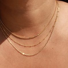 This flat gold filled bead chain is both trendy and simple. The delicate design makes it perfect to pair with any of your current staples, or for a unique look you can layer it with additional pieces. Its versatility and subtle shine makes it a great addition to any look. • Single Chain Necklace• Gold Filled• Length: 16" + 1" extender (to make adjustable to wear at different lengths)• Width: 2mm Minimalist Gold-plated Beaded Chain Necklace, Gold Chain Necklace With Tiny Beads For Everyday, 14k Gold Filled Beaded Chain Necklace, Everyday Gold Chain Necklace With Tiny Beads, Gold Minimalist Layered Necklace With Beaded Chain, Gold Layered Necklace With Delicate Chain And Round Beads, Delicate Gold Chain Necklace With Tiny Beads, Everyday Jewelry Gold, Body Sweat