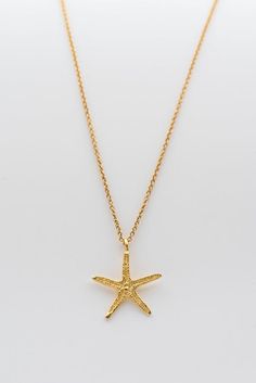 14k gold  Starfish pendant hangs on a fine 14k gold woven chain. ALL 14K SOLID GOLD !Dainty and classic must-have, effortlessly chic, perfect by itself or layered with other necklaces for a total boho-chic look. ►Material:♦ 14K Yellow GOLD - NOT plated or gold filled!!!►Measurements:♦ Necklace length: 45 cm (17.71")♦ Necklace width: 0.039" inch (1 mm)♦ Pendant: 13 mm (0.5 ") diameter____________________________________________________________♥ Everything in my shop is handmade by me with lots of Ocean-inspired Gold Jewelry With Starfish Charm, Yellow Gold Starfish Jewelry In Ocean-inspired Style, Gold Jewelry With Starfish Charm As A Gift, Gold Jewelry With Starfish Charm For Gift, Yellow Gold Starfish Ocean-inspired Jewelry, Ocean-inspired Starfish Yellow Gold Jewelry, Gold Starfish Charm Jewelry, Gold Necklace With Starfish Charm For Gift, Yellow Gold Star Necklaces With Starfish Charm