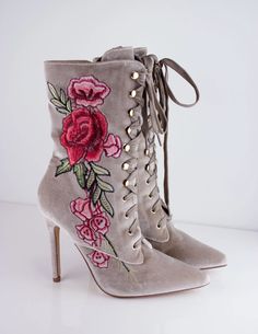 Our SISITINE booties have flowers embroidered onto its velvet outer shell and gold metal accents. Heel height: 4.2" High Heel Floral Print Boots For Party, High Heel Floral Print Party Boots, Elegant Party Boots With Embroidery, Fall Embroidered High Heel Boots, Elegant Embroidered Pointed Toe Boots, Embroidered High Heel Boots For Spring, Party High Heel Embroidered Boots, Spring Party Boots With Floral Embroidery, Spring High Heel Boots With Floral Embroidery