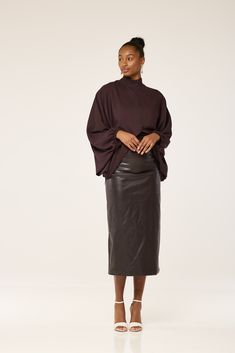 Dress up with this cool and calm look tunic. Cut from a luxurious silkfabric. This piece is designed in an oversized, tunic style to flatter yourbody as you step out. The feel and texture of the fabric gives it a uniqueflowy look. It features a feminine v at the front and a high neck line andfun long length sleeves that can be adjusted to any length. Accessorisewith a neck chain or a broach for a more detailed effect, or leave plainfor a classy chic look. Pair with a matching color or a contrast Satin Tunic, Social Circles, Brown Satin, Oversized Tunic, Tunic Style, Neck Chain, Classy Chic, Tunic Styles, Independent Designers Fashion