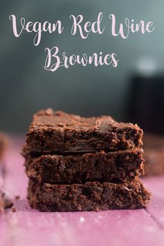 vegan red wine brownies stacked on top of each other with text overlay