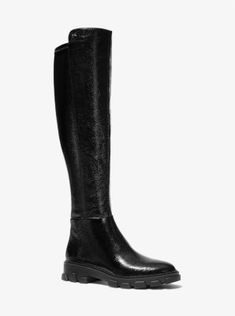 Our Ridley boot combines classic equestrian style with of-the-moment appeal. Crafted from crackled faux patent leather for a tactile finish it features a rubber tread sole and side zip fastening for easy wear. Team this pair with everything from sharply tailored separates to the season’s printed dresses. Knee-high Patent Leather Boots For Work, Sleek Patent Leather Knee-high Boots For Fall, Michael Kors Boots For Fall, Michael Kors Leather Boots For Fall, Modern Patent Leather Knee-high Boots For Formal Occasions, Michael Kors Round Toe Boots For Fall, Chic Black Patent Leather Knee-high Boots, Luxury Patent Leather Knee-high Boots For Formal Occasions, Modern Patent Leather Knee-high Boots