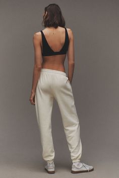 These sweatpants provide a stylish and relaxed choice for bridesmaids, merging comfort with a hint of bridal charm, ideal for pre-wedding festivities and cozying up during wedding preparations. | Bridesmaid Jogger Sweatpants by Anthropologie Weddings in Beige, Women's, Size: Medium, Polyester/Cotton Relaxed Joggers For Loungewear, Elegant Cream Bottoms For Loungewear, Chic Sweatpants For Lounging With Elastic Waistband, Chic Sweatpants With Elastic Waistband For Lounging, Chic Cotton Sweatpants For Lounging, White Sweatpants With Elastic Waistband For Relaxation, Chic Joggers For Loungewear, Cream Sweatpants For Loungewear, Cream Sweatpants With Elastic Waistband