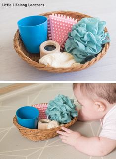 a baby playing with some toys in a basket