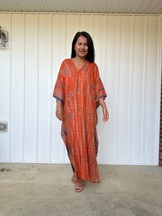 MALA handworks iynta Kaftan in Orange and Blue Tie Dye Bohemian Maxi Length Tunic With Relaxed Fit, Rayon V-neck Kaftan For Beach Cover-up, V-neck Rayon Kaftan For Beach Cover-up, Bohemian Long Relaxed Fit Tunic, Bohemian Style Long Relaxed Fit Tunic, Flowy Long Tunic For Festival, Beach Tunic Kaftan In Rayon, Bohemian Long Batik Print Kaftan, Long Bohemian Batik Print Kaftan