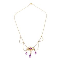 A fine Edwardian style festoon necklace.  In 14 karat yellow gold.  Centered on an ornate gold yolk with a bezel-set oval-cut amethyst.   Supporting 3 drops with freshwater river pearls and briolette-cut amethysts and flanked by several festooned swags punctuated by pearl mounts to the chain.  Simply a wonderful, delicate festoon necklace!  Date:  20th Century  Overall Condition: It is in overall good, as-pictured, used estate condition with some fine & light surface scratches and other signs of expected light wear consistent with age.  Fineness: Marked 14k for gold fineness.   Marks: Marked 14 to the clasp.  Gemstone Measurements: Amethyst cabochon: ca. 6.5 x 4.23 x  3.27 mm Largest Amethyst Drop: Length: ca. 9.5 mm Diam: ca. 5.2 mm  Measurements: Chain Length: ca. 16 in. Pendant: Height: Fine Jewelry Yellow Gold Amethyst Necklaces, Fine Jewelry Amethyst Necklace In Yellow Gold, Fine Jewelry Amethyst Necklaces In Yellow Gold, Yellow Gold Amethyst Necklace Hallmarked, Art Nouveau Yellow Gold Gemstone Necklaces, Vintage Amethyst Yellow Gold Necklace, Vintage Amethyst Necklace In Yellow Gold, Yellow Gold Oval Necklaces Art Nouveau Style, Yellow Gold Amethyst Necklace For Wedding