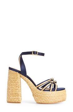 Soft indigo satin and braided raffia distinguish this elegant platform sandal with knotted vamp straps and a nonslip sole. 5 heel, 2" platform (size 39) Adjustable ankle strap with buckle closure Textile and raffia upper/leather lining/leather and synthetic sole Made in Spain Designer Shoes Straw Sandals With Braided Ankle Straps, Chic Ankle Strap Straw Heels, Chic Straw Sandals For Party, Chic Party Sandals With Straw Material, Straw Ankle Strap Sandals For Party, Ankle Strap Straw Sandals For Party, Chic Heels With Wrapped Heel In Straw, Party Sandals With Ankle Strap In Straw, Party Ankle Strap Straw Sandals