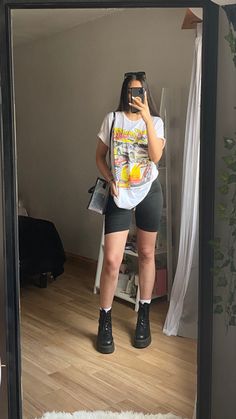 Biker Shorts With Combat Boots, Biker Shorts Combat Boots Outfit, Docs With Shorts Outfit, Casual Outfit With Combat Boots, Combat Boots And Shorts Outfit, Black Boots And Shorts Outfits, Combat Boots Shorts Outfit, Styled Graphic Tee Outfit, Boots And Biker Shorts Outfit